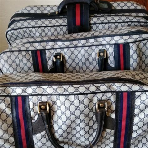 gucci luggage set.